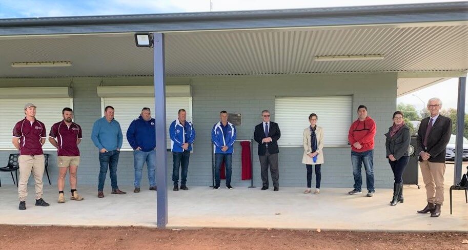 Member for Cootamundra Steph Cooke MP with Temora Mayor Rick Firman and members of Nixon Park user groups and construction workers under the amenities structure
