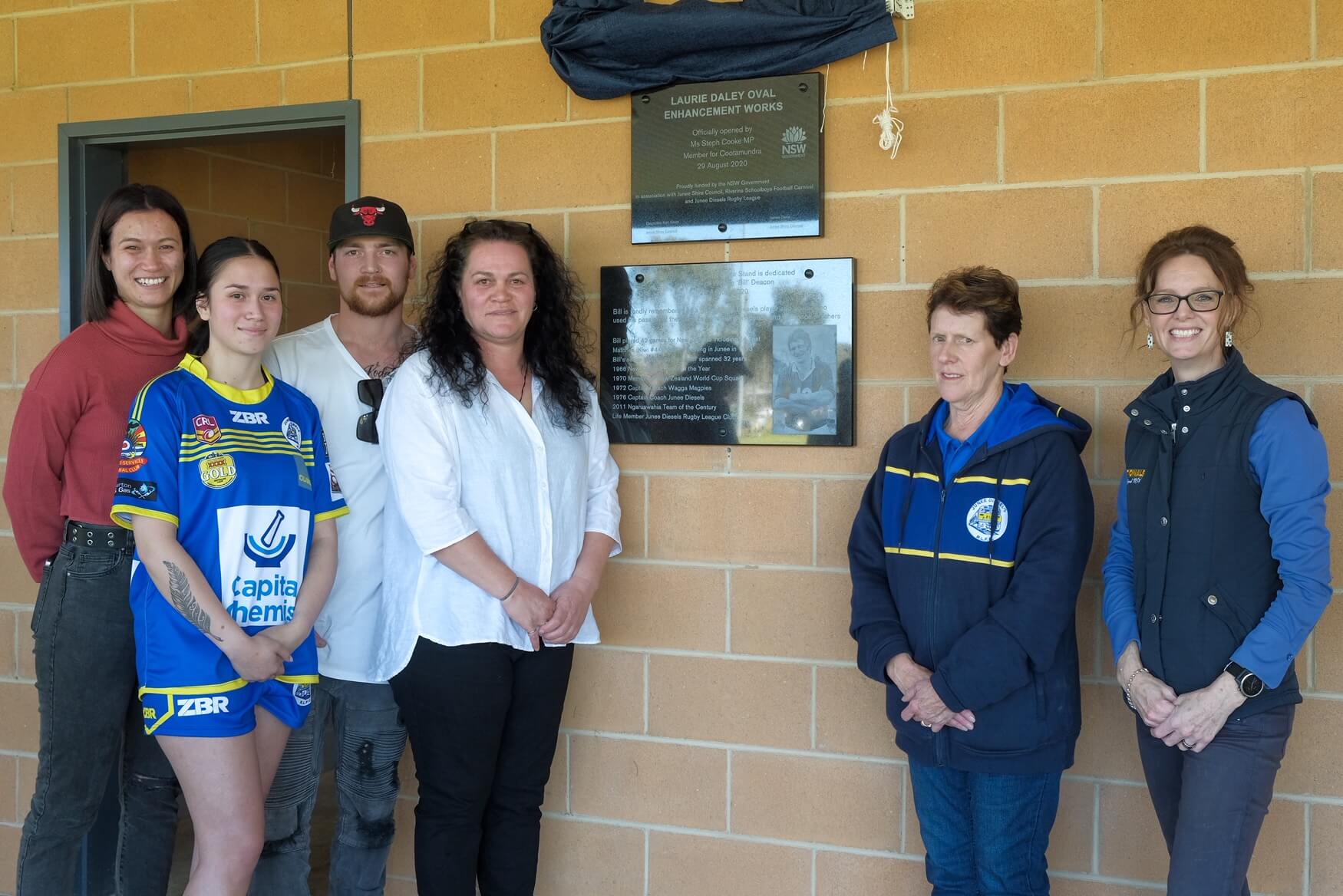 Billie Deacon, Maddy Deacon, Matt Logan, Lyandra Logan, Noreen Deacon and Steph Cooke MP in front of a brand new plaque on the new amenities building.